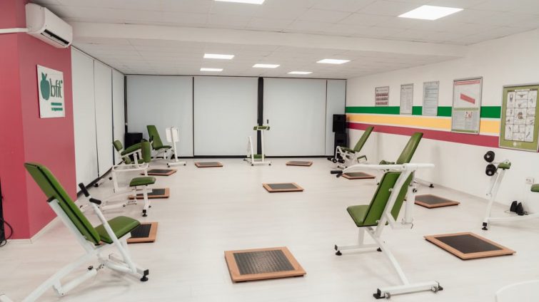Bright and spacious gym interior featuring modern green exercise machines in Yalova.